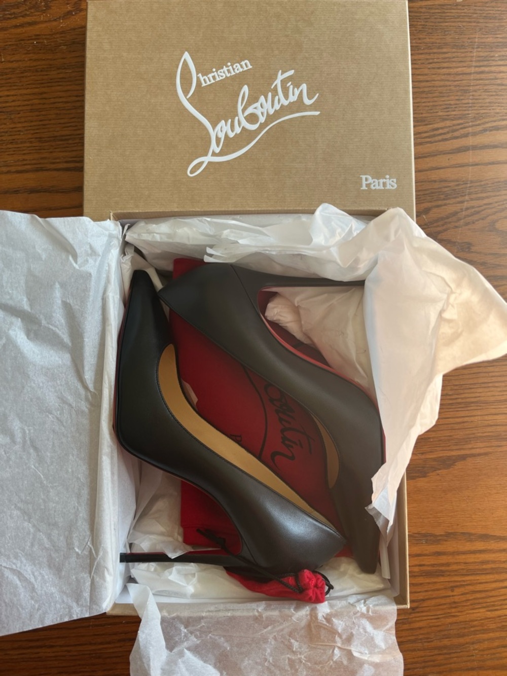 Christian Louboutin Black Pump with Iconic Red Sole